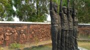 A sculpture in Sintang shows soldiers saluting