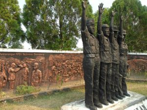 A sculpture in Sintang shows soldiers saluting