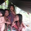 A mother and her three daughters in a Rimba house