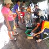 Volunteers hand out food to displaced families - Ternate