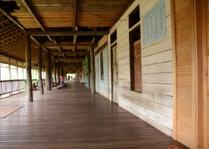 The communal verandah of a Dyak longhouse