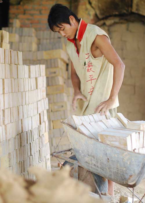 A Chinese-Indonesian worker in a brick factory in Kalimantan