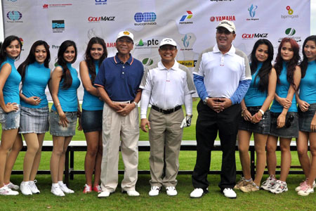 Indonesian ministers pose with mini-skirted golf caddies