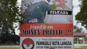 A poster in Aceh, Indonesia warns that selling votes leads to corruption